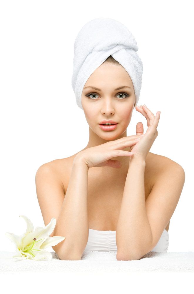 Beautiful woman in spa towels